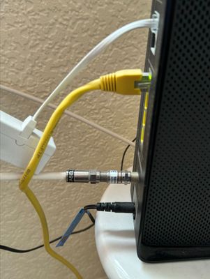 Broadband cable connected from wall outlet to Hub 3 Router