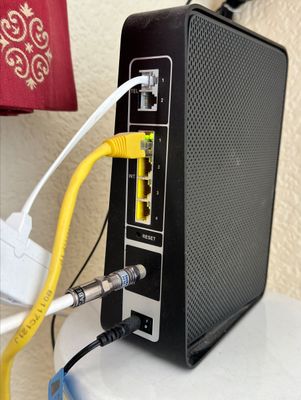 Broadband cable connected from wall outlet to Hub 3 Router